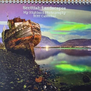 2027 Calendar FrontBring the wild beauty of the Scottish Highlands into your home every day. This premium wall calendar features 12 stunning high-resolution photographs by Pat McElhinney.